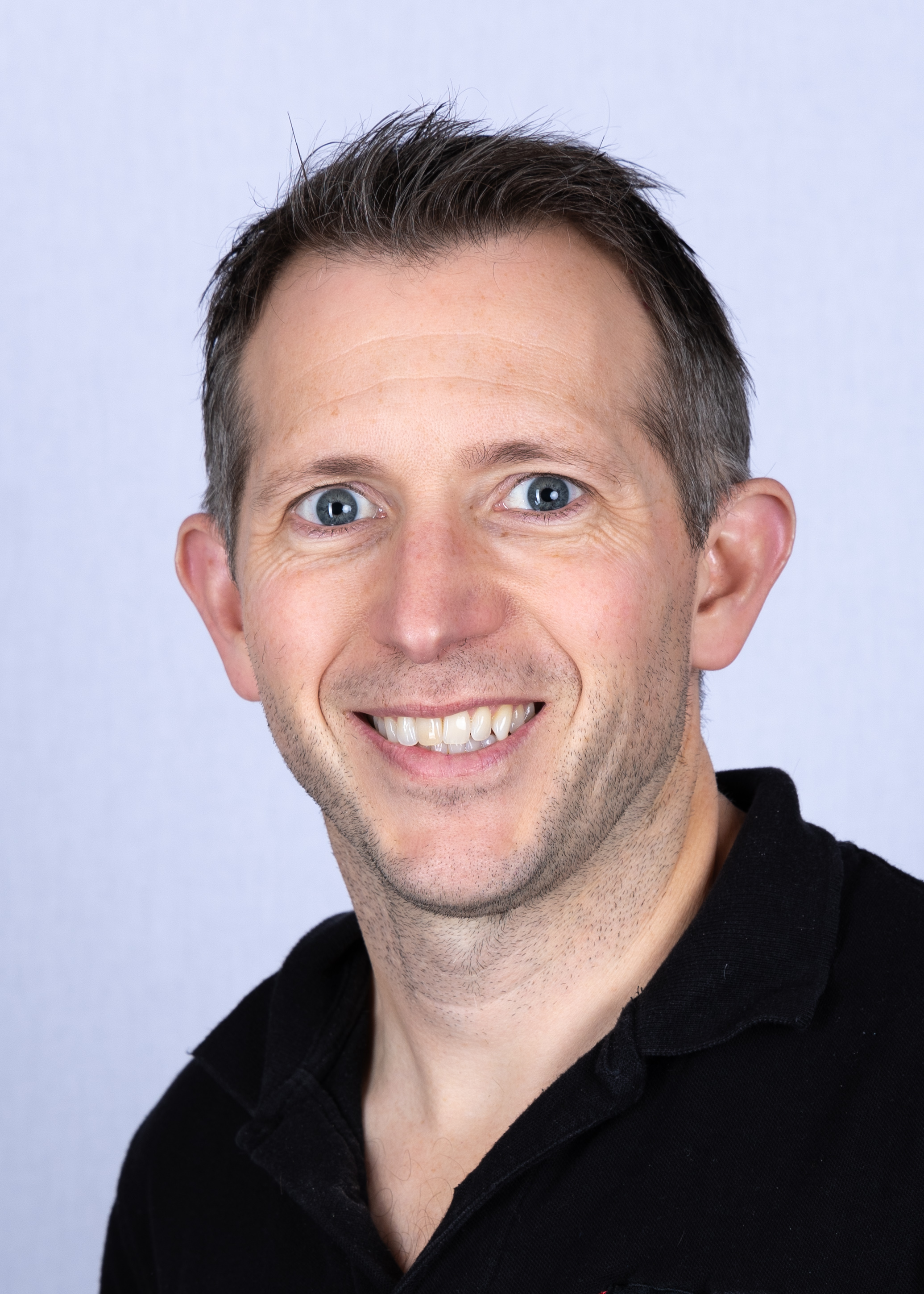 Headshot of Aegis Professor Fred Witham